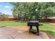 The backyard is fenced with a large patio area, perfect for outdoor entertaining at 162 Aylesbury Blvd, Mcdonough, GA 30252