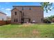 Large backyard with a patio and lush green grass, great for relaxing and entertaining at 162 Aylesbury Blvd, Mcdonough, GA 30252