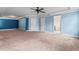 Large bedroom showing carpeted floors and doors to other areas at 162 Aylesbury Blvd, Mcdonough, GA 30252