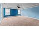 Spacious bedroom illuminated by windows and a fan at 162 Aylesbury Blvd, Mcdonough, GA 30252