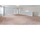 Bonus room featuring gray walls, neutral carpet, and multiple entrances at 162 Aylesbury Blvd, Mcdonough, GA 30252