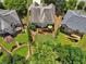 Beautiful backyard showcasing a wooden deck, landscaped lawn, and mature trees, perfect for outdoor entertaining at 5511 Highland Preserve Dr, Mableton, GA 30126