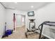 Basement with carpet and an exercise area including free weights and a treadmill at 5511 Highland Preserve Dr, Mableton, GA 30126