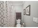 Bathroom featuring a shower-tub combination and neutral colors at 5511 Highland Preserve Dr, Mableton, GA 30126