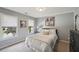 Cozy bedroom with bright windows and a full bed at 5511 Highland Preserve Dr, Mableton, GA 30126