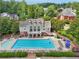 Enjoy the community pool area with lounge chairs and tables, perfect for relaxing and socializing with neighbors at 5511 Highland Preserve Dr, Mableton, GA 30126