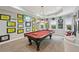 Open concept game room with a pool table and wall decor, plenty of space to relax at 5511 Highland Preserve Dr, Mableton, GA 30126