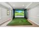 State-of-the-art golf simulator room, perfect for improving your swing and enjoying virtual courses at 5511 Highland Preserve Dr, Mableton, GA 30126