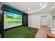 A state-of-the-art golf simulator room, offering a premium recreational experience at 5511 Highland Preserve Dr, Mableton, GA 30126