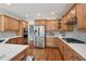 Spacious kitchen featuring stainless steel appliances, custom cabinetry, and lots of counter space at 5511 Highland Preserve Dr, Mableton, GA 30126