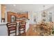 Well-lit eat-in kitchen with a breakfast bar and stainless steel appliances at 5511 Highland Preserve Dr, Mableton, GA 30126