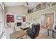 Spacious living room with a fireplace, built-in shelving, and high ceilings at 5511 Highland Preserve Dr, Mableton, GA 30126