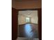 Spacious living room with hardwood floors, a ceiling fan, and a large window allowing natural light at 898 Oak St Sw # 1311, Atlanta, GA 30310
