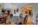 Combined sun room and dining area open to kitchen in this spacious home at 1349 Springwood Nw Dr, Conyers, GA 30012