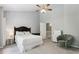 Spacious bedroom features neutral walls, and an inviting sitting area, perfect for relaxing and unwinding at 208 Hembree Park Ter, Roswell, GA 30076