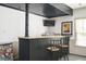 Basement bar with stone countertop, seating for two and Richmond VA signage at 2689 Spring Rock Ne Ct, Roswell, GA 30075