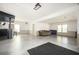 Open basement featuring neutral paint, wainscoting and a bar area at 2689 Spring Rock Ne Ct, Roswell, GA 30075