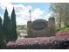 East Spring Lake community stone entrance with lush landscaping at 2689 Spring Rock Ne Ct, Roswell, GA 30075