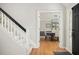 A view of the home's entrance, showcasing hardwood floors and staircase to the second floor at 2689 Spring Rock Ne Ct, Roswell, GA 30075
