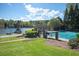 Community pool with beautiful lake view and mature trees in a desirable neighborhood at 2689 Spring Rock Ne Ct, Roswell, GA 30075