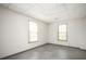 Bright room with two windows offering ample natural light and neutral walls at 2689 Spring Rock Ne Ct, Roswell, GA 30075