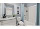 Bathroom features a tub, toilet, and vanity with granite countertop at 2810 Georgia Aster Nw Way # 6, Atlanta, GA 30318