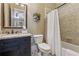 Full bathroom with granite vanity top and shower/tub combo at 3405 Camellia Ln, Suwanee, GA 30024