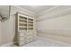 Well-organized walk-in closet with built-in shelving and ample storage space at 3405 Camellia Ln, Suwanee, GA 30024