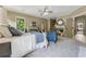 Bedroom featuring a fireplace, plush carpeting, and a soothing color palette at 3405 Camellia Ln, Suwanee, GA 30024