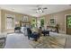 Spacious main bedroom with calming color palette and private balcony access at 3405 Camellia Ln, Suwanee, GA 30024