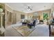 Airy bedroom with a ceiling fan, neutral tones, and natural light at 3405 Camellia Ln, Suwanee, GA 30024