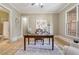 Bright office space featuring hardwood floors, large windows, and adjoining bath at 3405 Camellia Ln, Suwanee, GA 30024