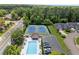 Aerial view showing community tennis courts, pool, parking, and well-maintained landscaping at 170 Shelli Ln, Roswell, GA 30075