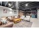 Finished basement features a projector, brick accents, full bar and leather couches at 170 Shelli Ln, Roswell, GA 30075