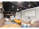 Finished basement with a large projector screen, full bar and brick accents at 170 Shelli Ln, Roswell, GA 30075