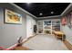 Finished basement offers versatile space with ample storage, shelving, and gray color scheme at 170 Shelli Ln, Roswell, GA 30075