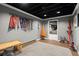 Finished basement with decorative pennants, offers versatile space for recreation and relaxation at 170 Shelli Ln, Roswell, GA 30075