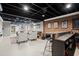 Finished basement with full bar, open ceiling and plenty of space to entertain at 170 Shelli Ln, Roswell, GA 30075