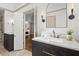 Elegant primary bathroom with dual vanities and doorway to bedroom at 170 Shelli Ln, Roswell, GA 30075