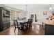 Dining room with hardwood floors, chandelier lighting, and French door access to another room at 170 Shelli Ln, Roswell, GA 30075