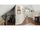 Hallway features hardwood floors, neutral walls, and plenty of art for decor at 170 Shelli Ln, Roswell, GA 30075