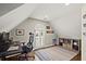Home office features natural light, a desk and chair, wood floors and an area rug at 170 Shelli Ln, Roswell, GA 30075