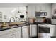 Modern kitchen features stainless steel appliances and granite countertops at 170 Shelli Ln, Roswell, GA 30075
