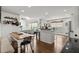 Open-concept kitchen and dining area with bar seating at 170 Shelli Ln, Roswell, GA 30075