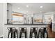 Kitchen bar featuring granite countertops and seating for four at 170 Shelli Ln, Roswell, GA 30075