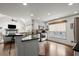 Open kitchen with granite countertops, stainless steel appliances, and hardwood floors at 170 Shelli Ln, Roswell, GA 30075