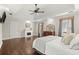Inviting main bedroom features a fireplace and hardwood floors at 170 Shelli Ln, Roswell, GA 30075