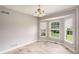 Bright dining room with large windows, ideal for enjoying meals in a sunlit space at 350 Dailey Mill Rd, Mcdonough, GA 30253