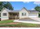 Charming one-story home with a manicured lawn and attached garage, providing comfort and convenience at 350 Dailey Mill Rd, Mcdonough, GA 30253