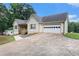 Lovely one-story home with a garage and mature trees, offering privacy and curb appeal at 350 Dailey Mill Rd, Mcdonough, GA 30253